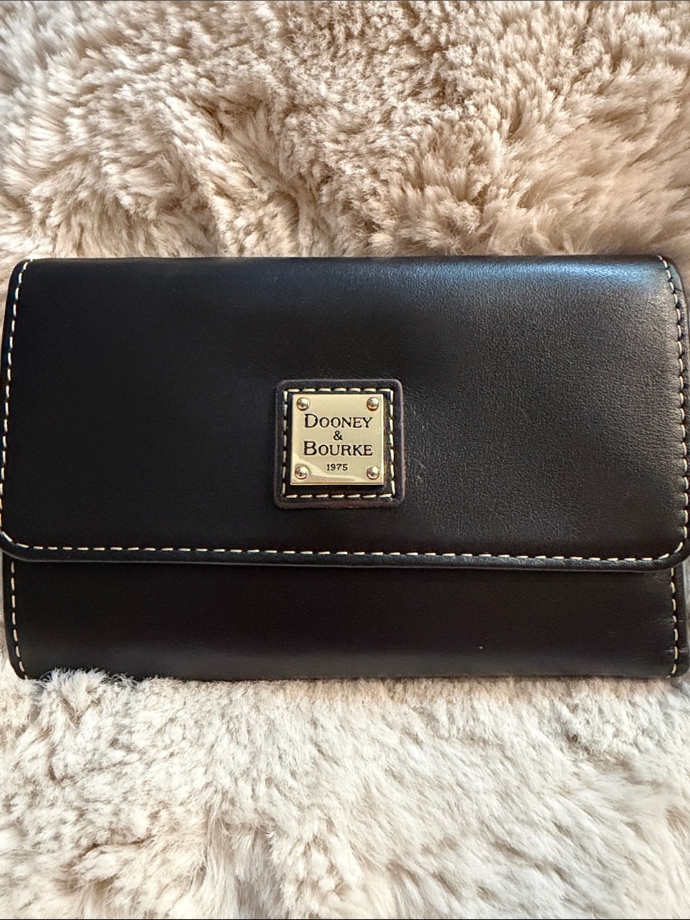 Dooney & Bourke Black Leather Tri Fold Wallet with Gold 1975 Logo Plaque